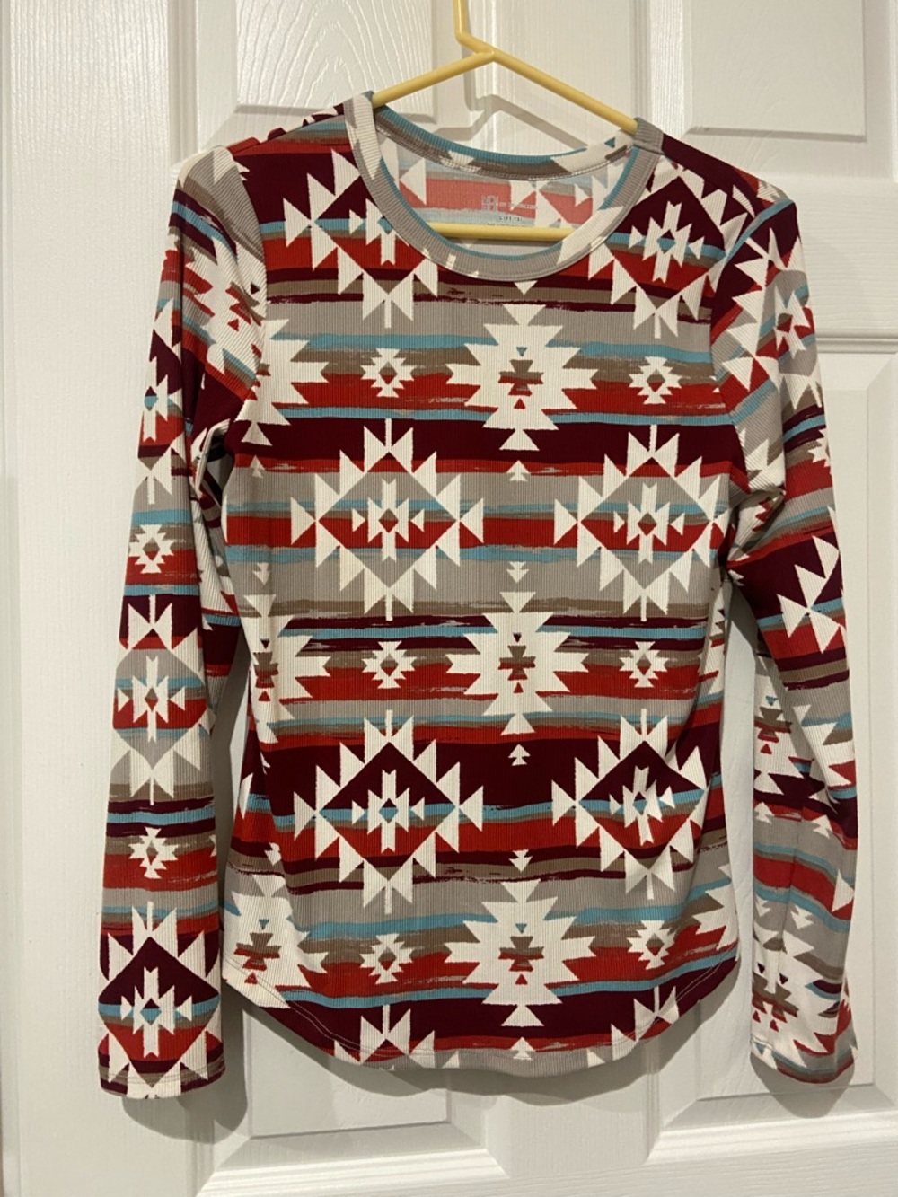 No Boundaries Burgundy Aztec Long Sleeve Top with Teal Accents